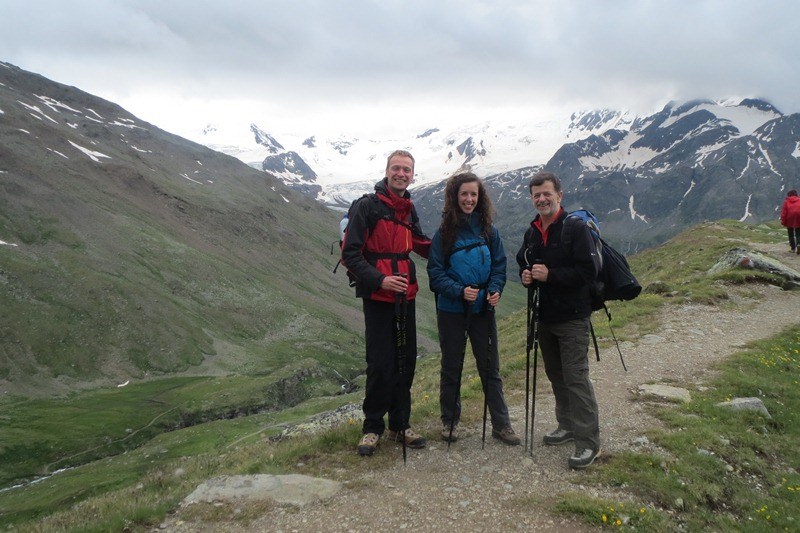 Three happy faces after an all-day tour.