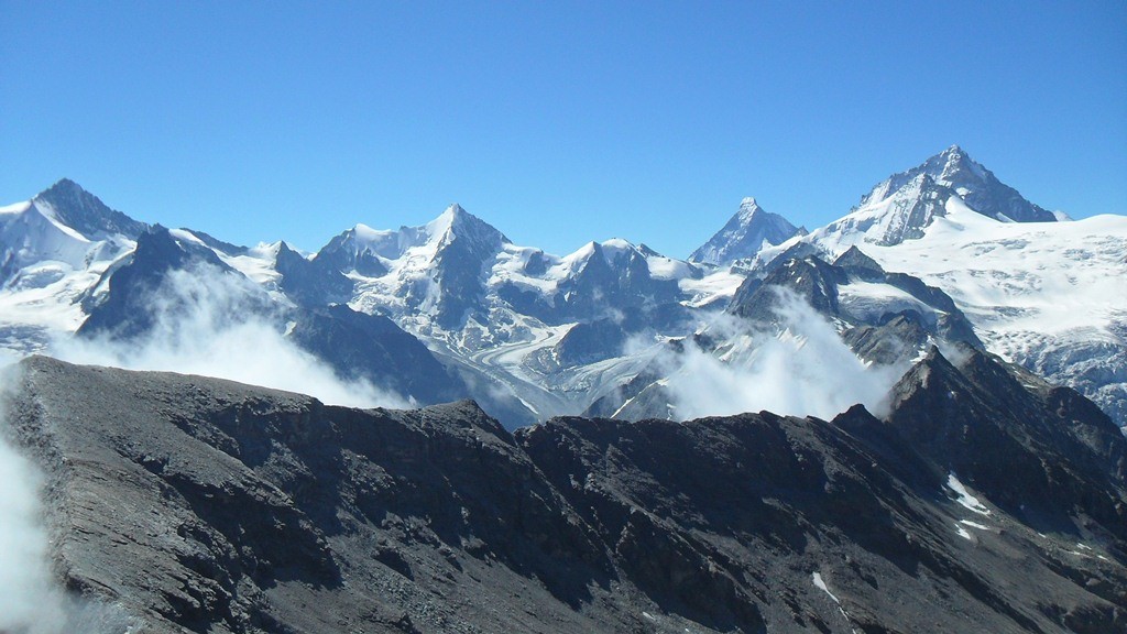 From right to left: Dent Blanche (4357 m), Matterhorn (4478), Zinalrothorn (4221 m), Weisshorn (4506 m).