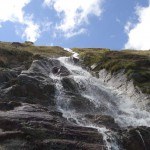 A beautiful water stream on the route toward Ramol hut in the Austrian Alps.