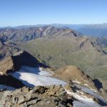 View from the summit toward the Gavia pass. Bivacco Seveso is the red dot on the ridge.