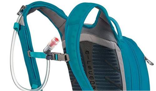 The hydration system with magnetic bite valve and zippered sleeve on the right shoulder strap for water hose. 