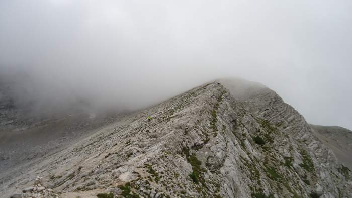 This is the lower section of the ridge which leads to the summit, it is somewhere in the clouds above.