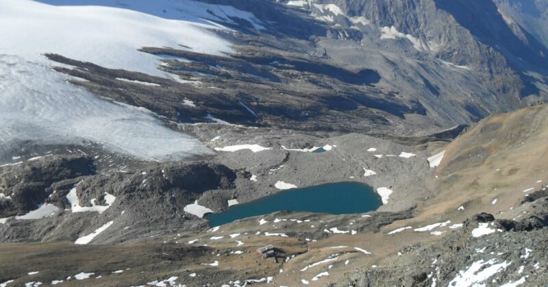 Lake Aurona and Monte Leone hut, view from Wasenhorn, Swiss Alps.