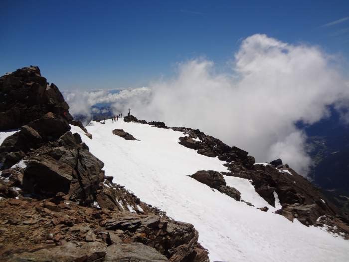 The cross as seen from the true summit.