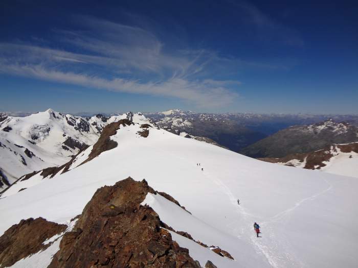 Large snow areas behind the summit.