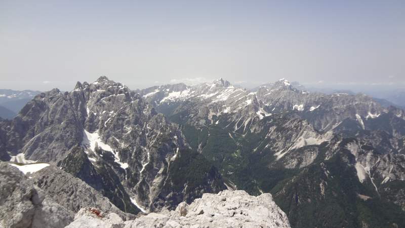 View from the summit. From right: Mangart, Jalovec, and Razor.