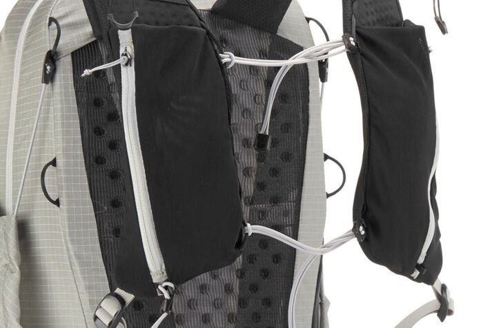 There are 4 pockets on the shoulder harness.