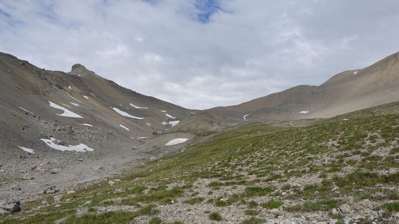 Saddle between two peaks. 