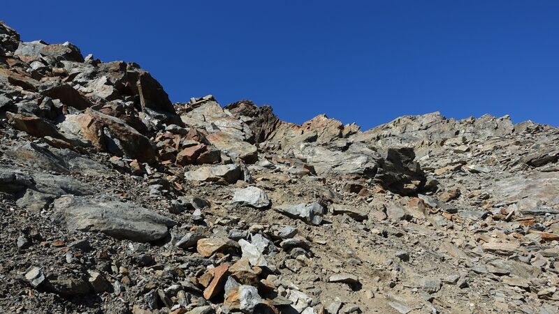 Steep access with loose and unstable rocks.
