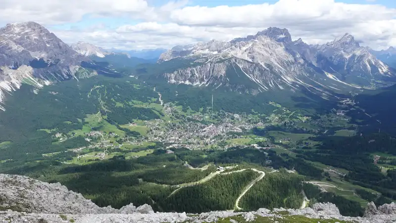 After walking from Pie Tofana for one hour or so, Cortina d'Ampezzo.