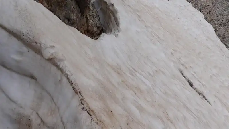 Lots of snow in the couloir area.