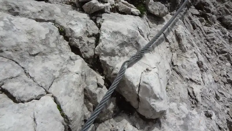 A damaged via ferrata cable.