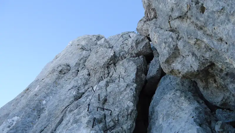 A short ferrata passage under the summit of Razor in Slovenian Alps.