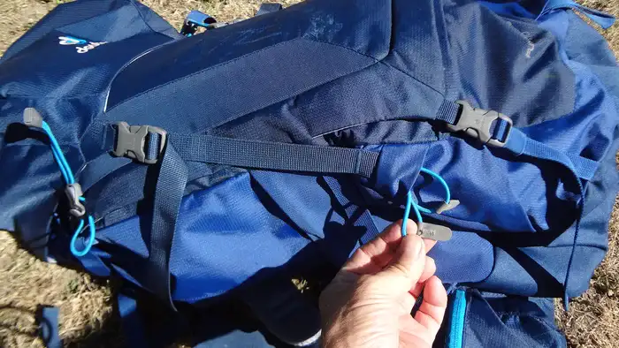 Trekking poles attachment system.