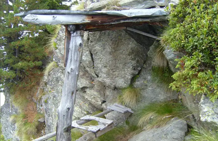 An out house used as a rain shelter.