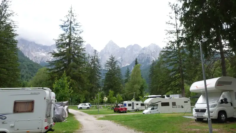 The bivouac area is visible from the camping in the village Gozd Martuljek.